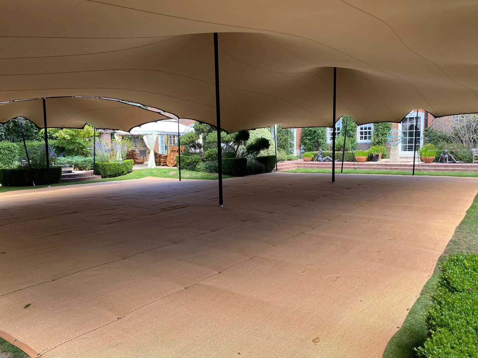 Our luxury, woven, corn matting can be laid over grass. It offers a stable surface that is perfectly suitable for high heels