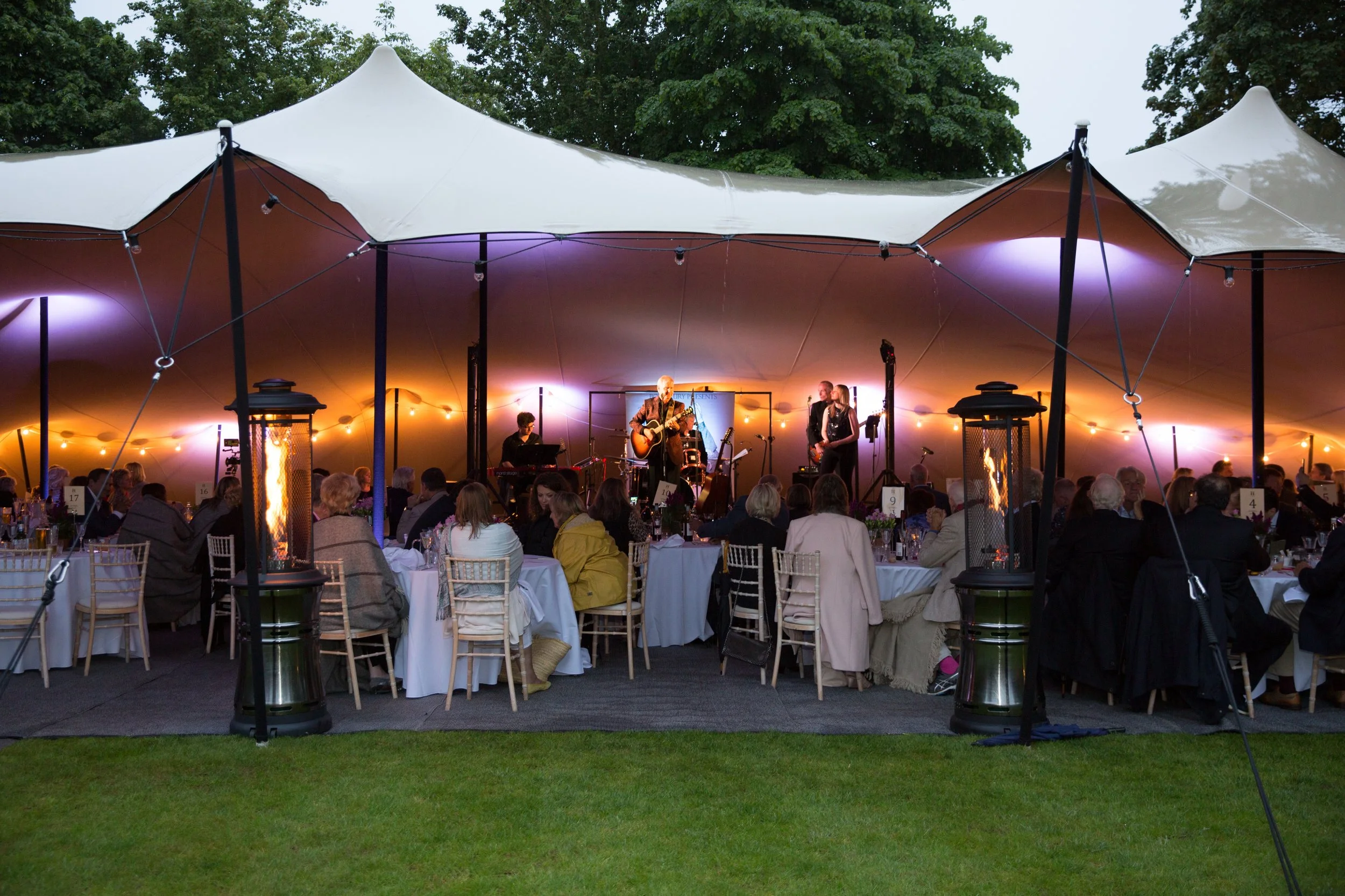 LED up-lighters light the ceiling of the tent. They can be set to match any colour scheme