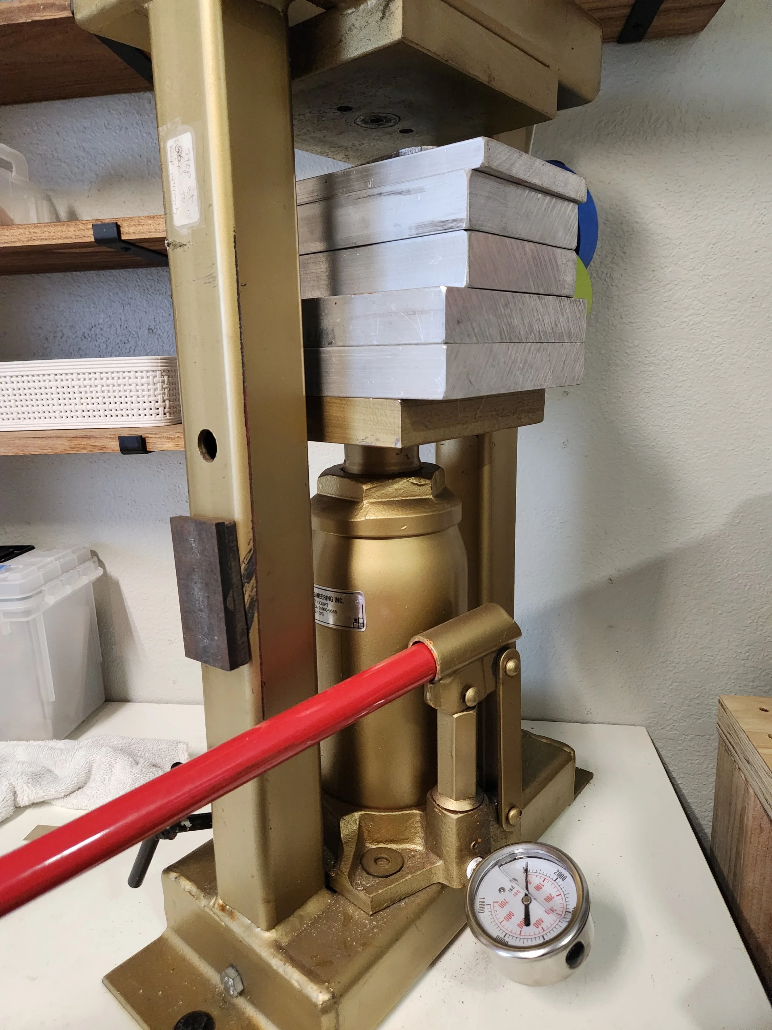 Hydraulic press used in forming and die-striking metal.