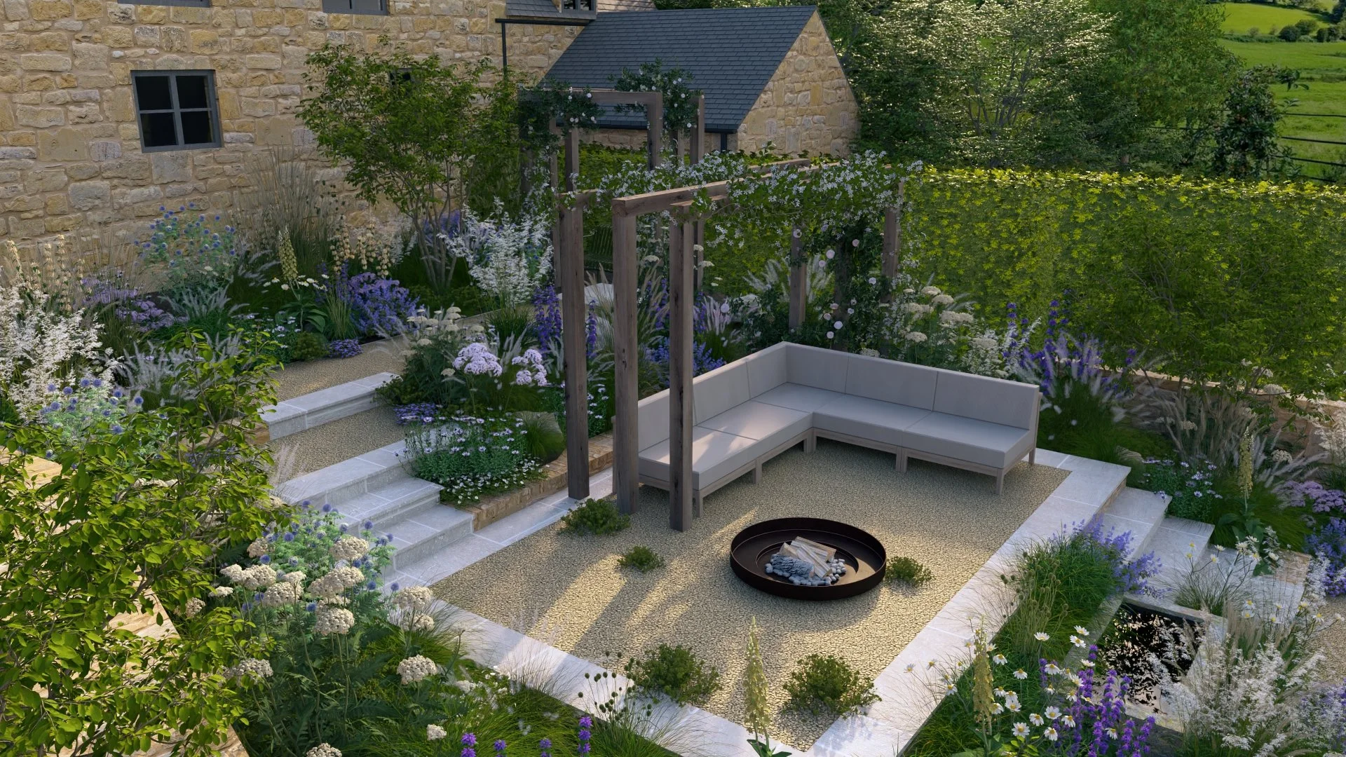 A backyard garden with stone steps, gravel planting, lush green plants, colorful flowers, a circular fire pit with firewood, oak pergolas, a corner sofa and a stone water trough water feature