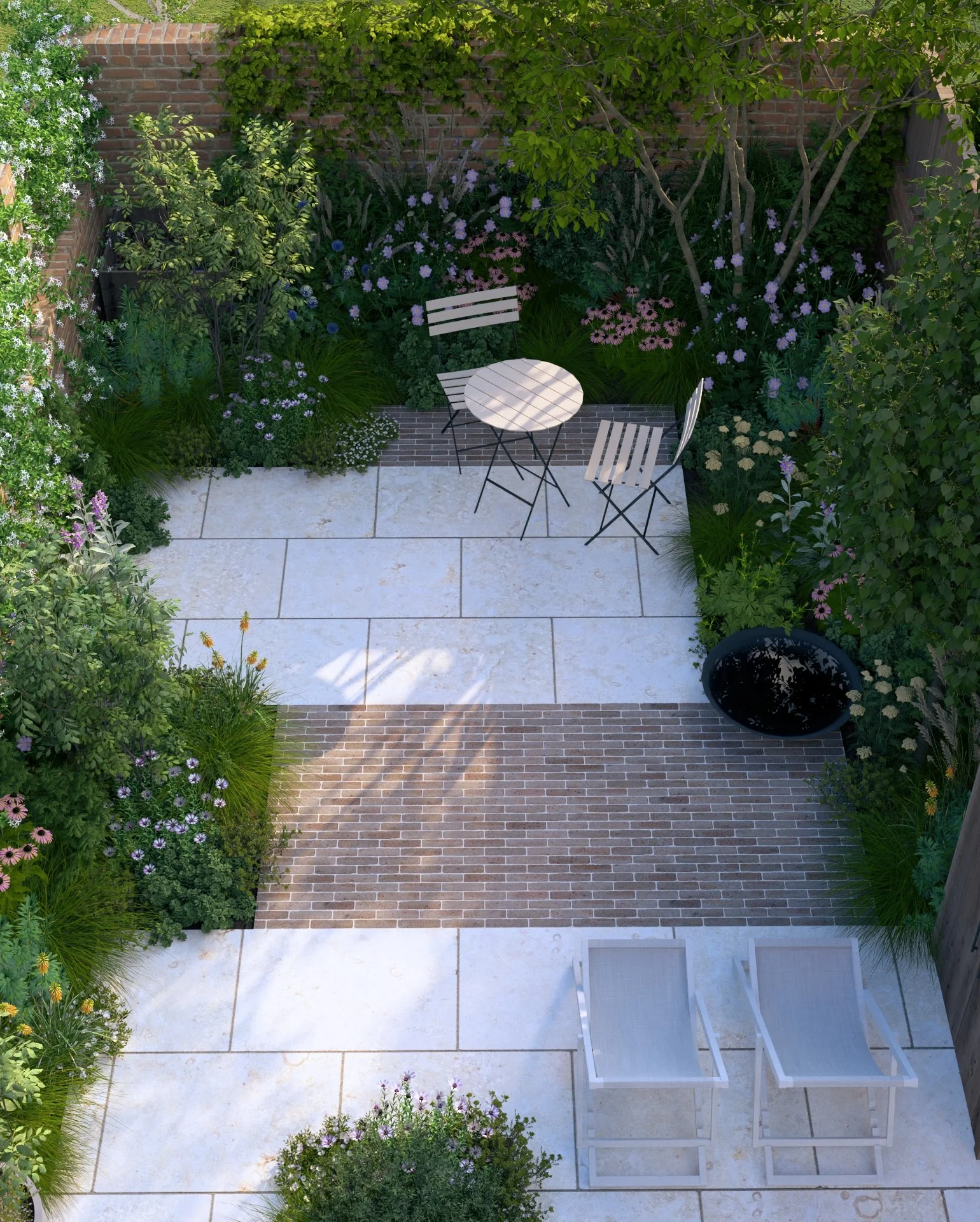 Top-down view of a small, outdoor garden patio with a round metal table, two white metal chairs, surrounded by lush green plants and colourful flowers, beautiful trees. Features clay pavers and limestone paving.
