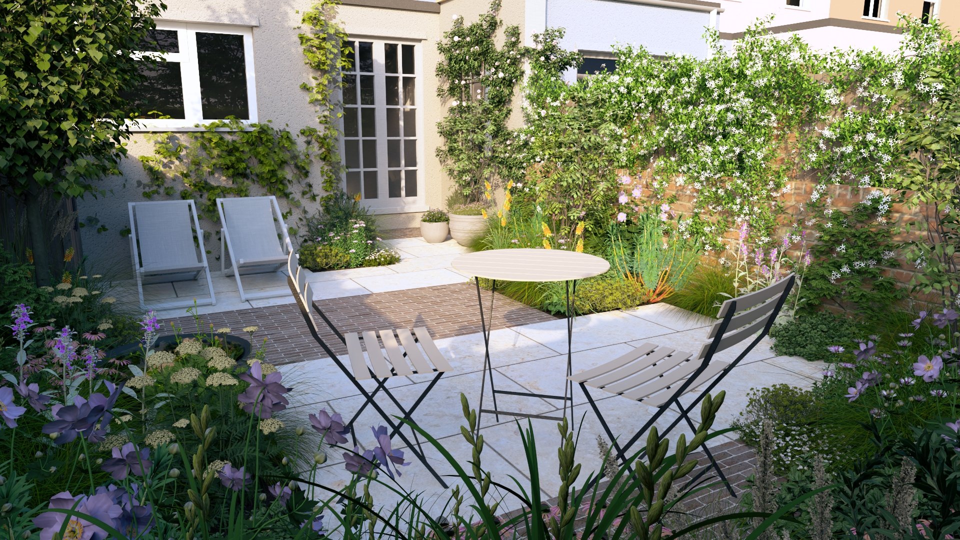 A cozy backyard patio with deckchairs and a bistro set, surrounded by lush green plants and blooming flowers, enclosed by a wall with climbing vines an outdoor mirror and a red brick section.
