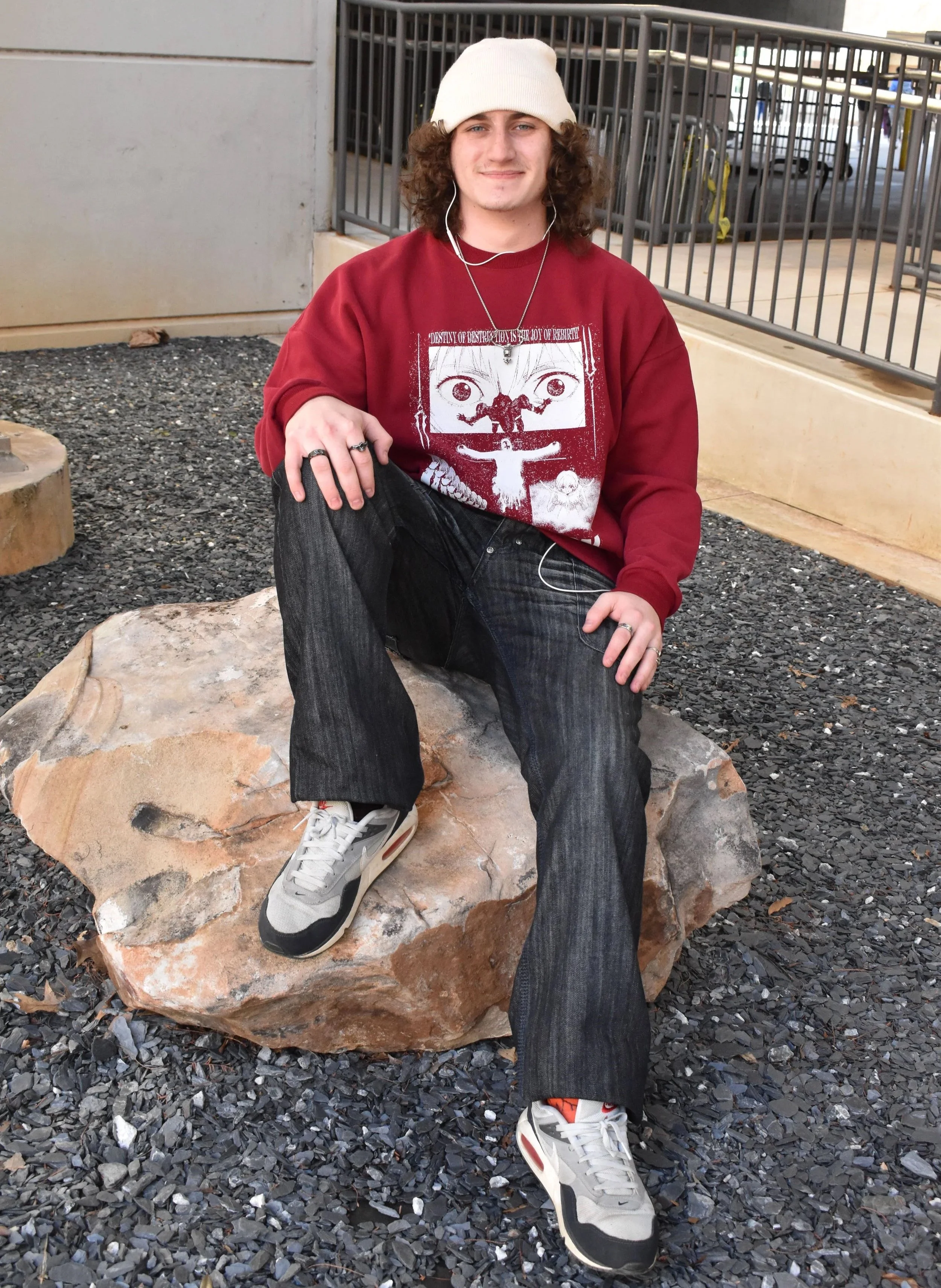 Collin Sitting On A Rock