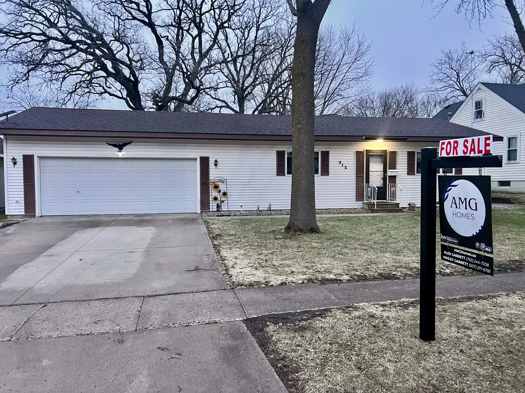 AMG Homes property for sale with sign in front.