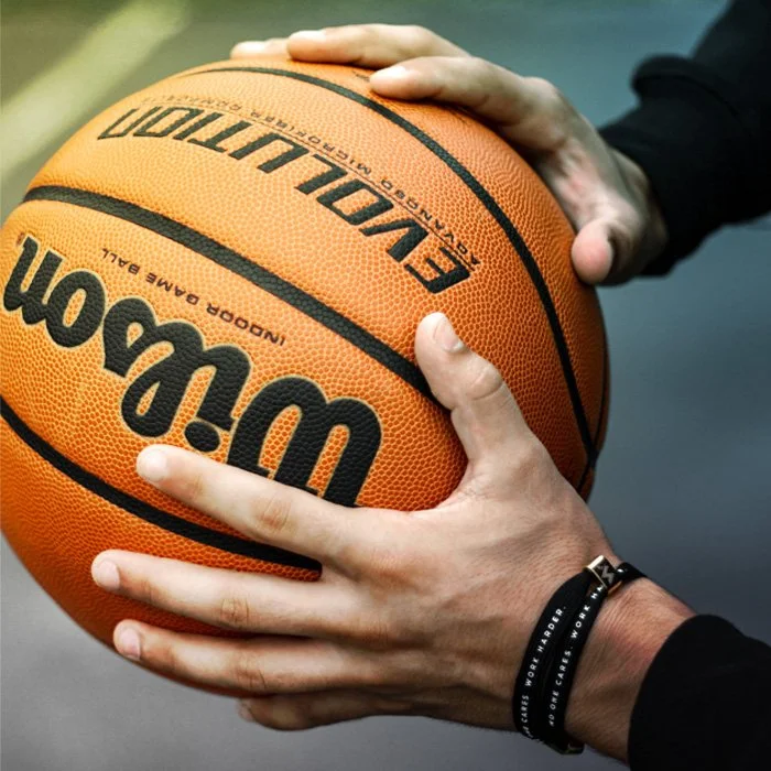 Holding a basketball