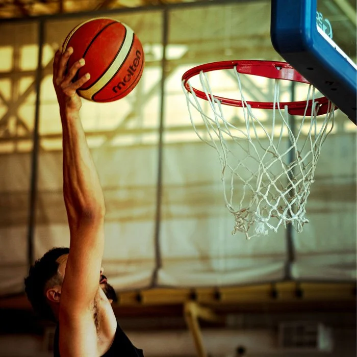 Dunking a basketball