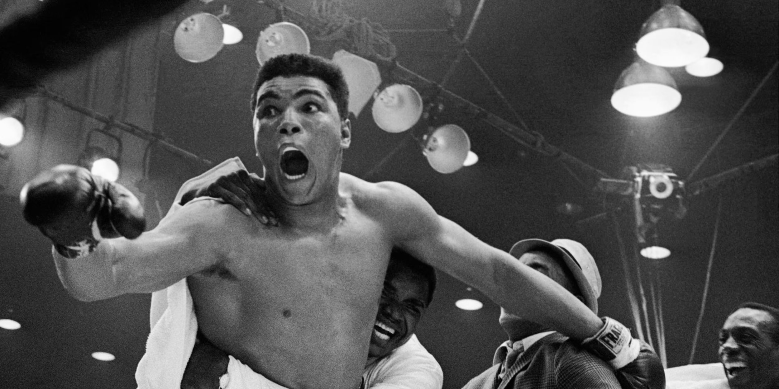 Clay celebrates wildly in the ring after beating Sonny Liston