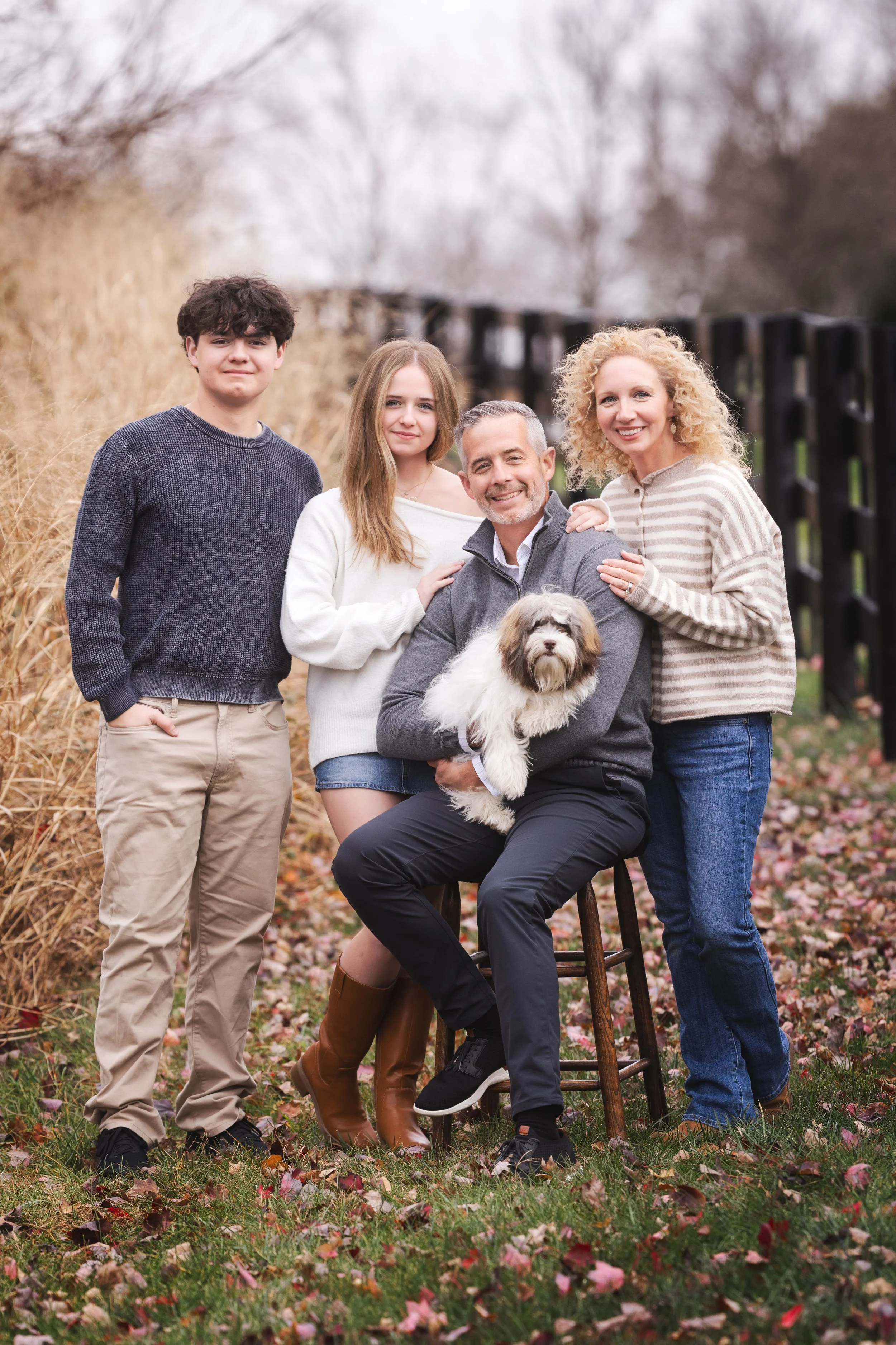 Mark Danzenbaker with his family, reflecting his personal experience supporting aging parents and managing family transitions.