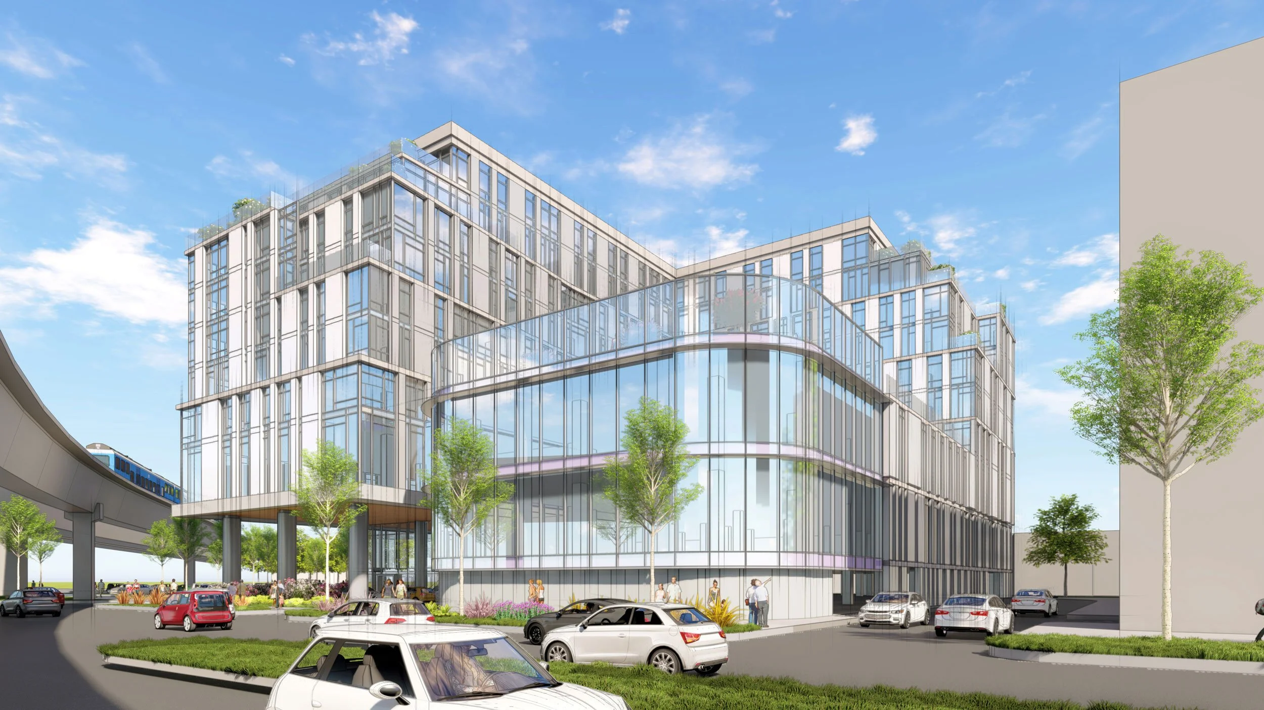 A modern glass office building with multiple floors, surrounded by trees and parked cars, under a blue sky with some clouds.