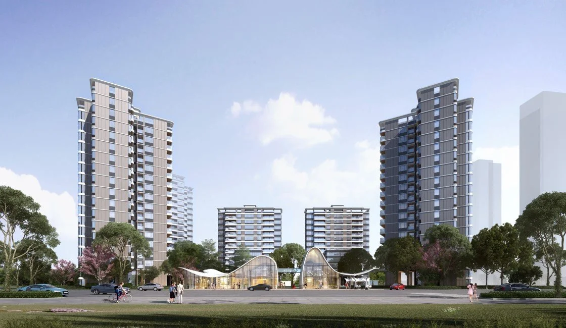 Modern high-rise residential buildings with commercial spaces at the ground level, surrounded by trees, people walking, and cars on the road under a blue sky