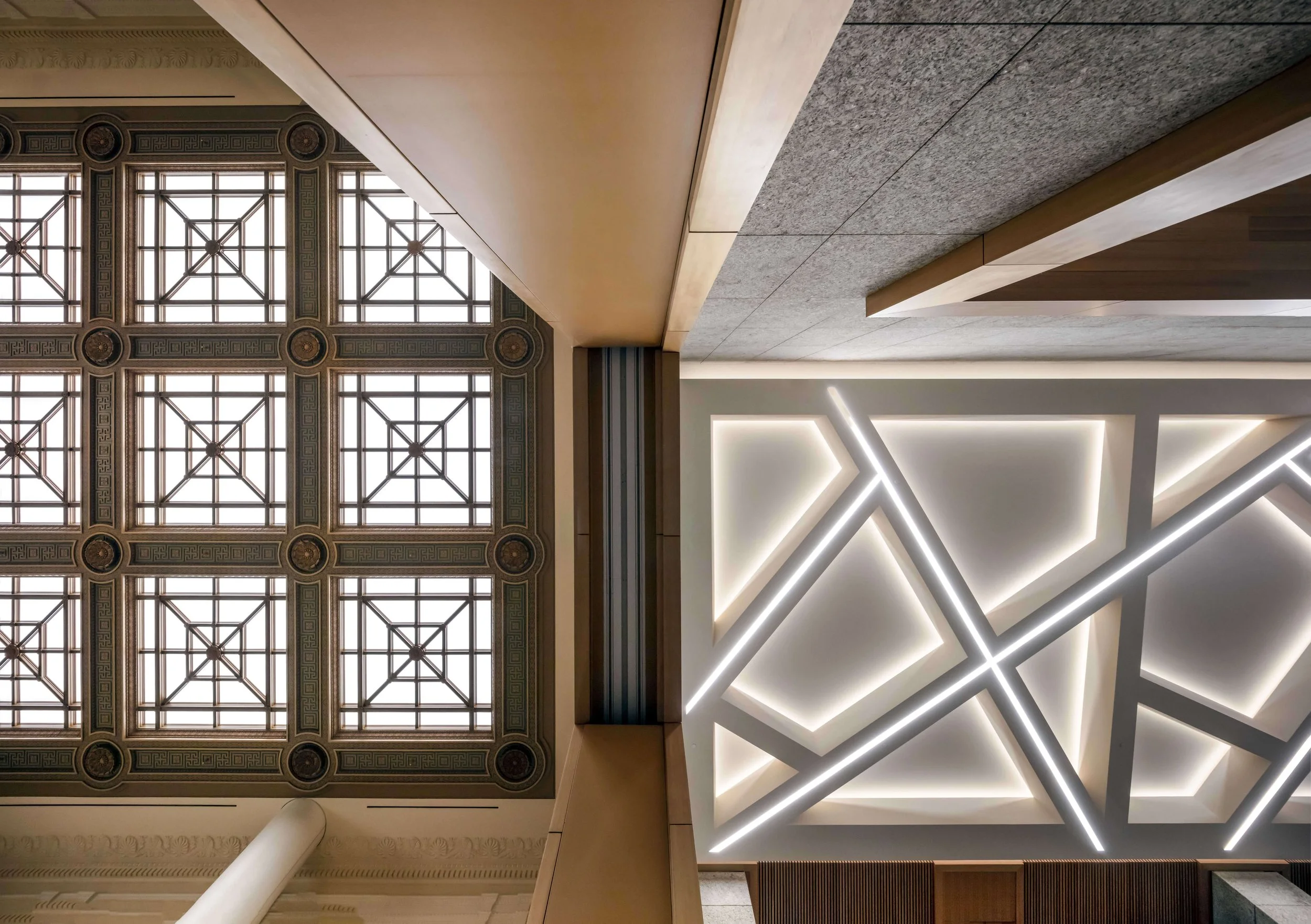 Interior ceiling with decorative grid windows on the left and modern geometric LED lighting on the right.