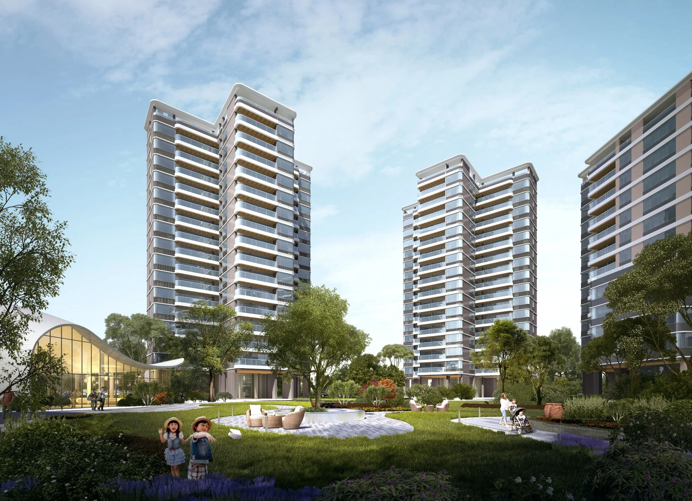 A modern residential complex with tall, sleek apartment buildings surrounded by greenery, trees, and landscaped outdoor seating areas. Children and adults are enjoying the outdoor space, with some children waving and a person pushing a stroller.