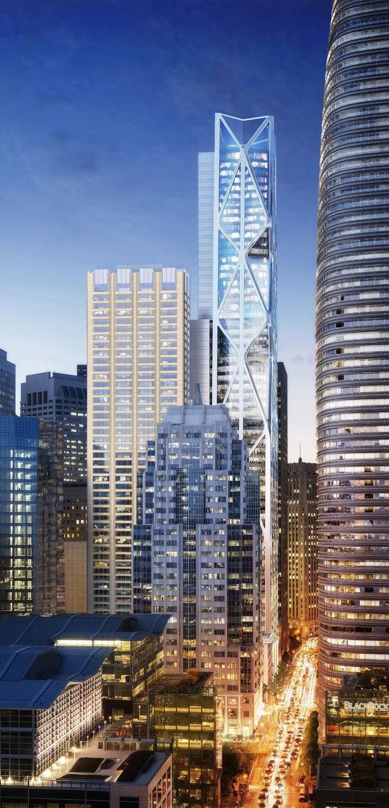 Cityscape with tall modern skyscrapers illuminated at dusk, showing a sunset sky and busy street with traffic below.