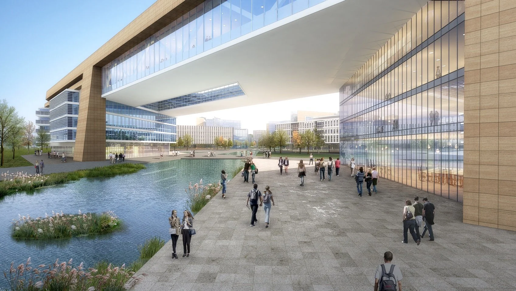 Modern office building with glass facade and a water feature in the foreground, people walking and talking outside on a paved plaza, trees and additional modern buildings in the background.