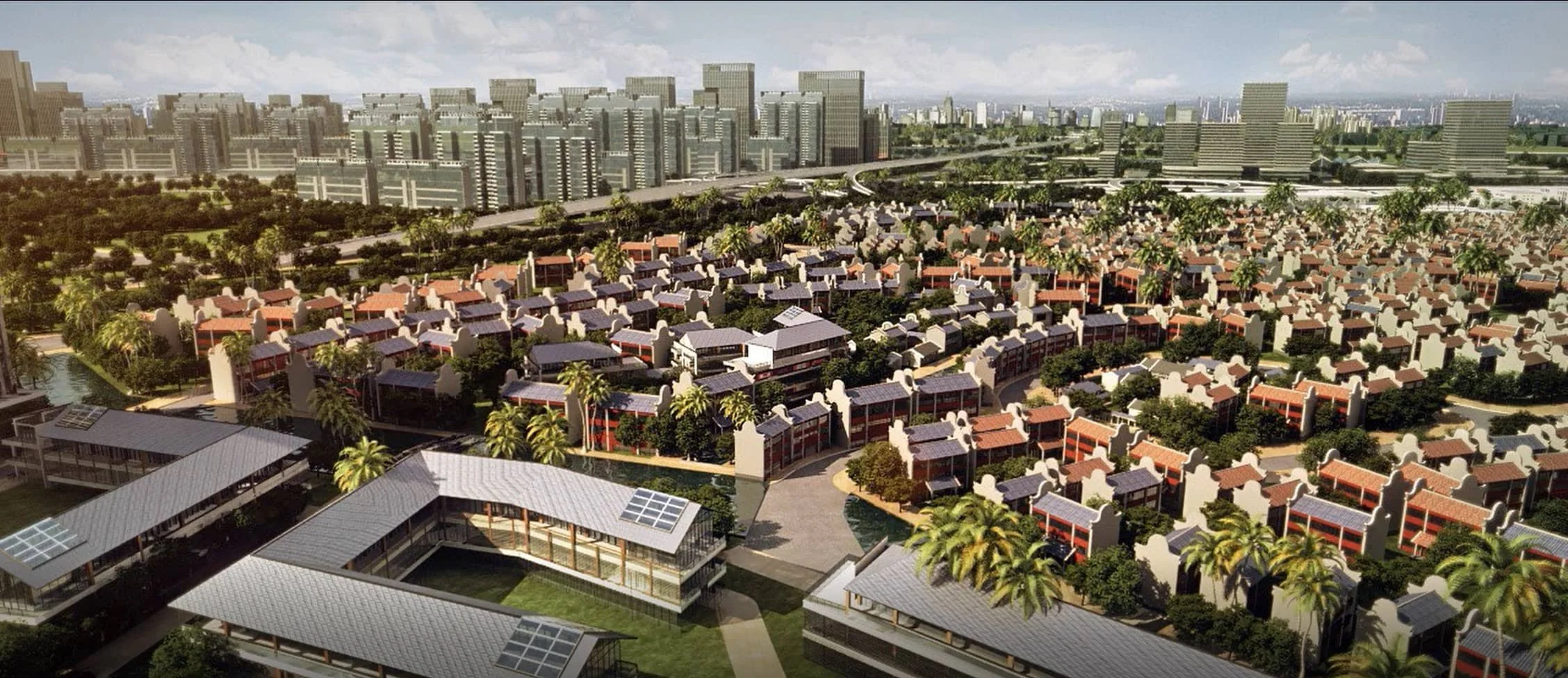 Aerial view of a modern cityscape with a mix of high-rise buildings and traditional-style houses, surrounded by lush greenery and palm trees.