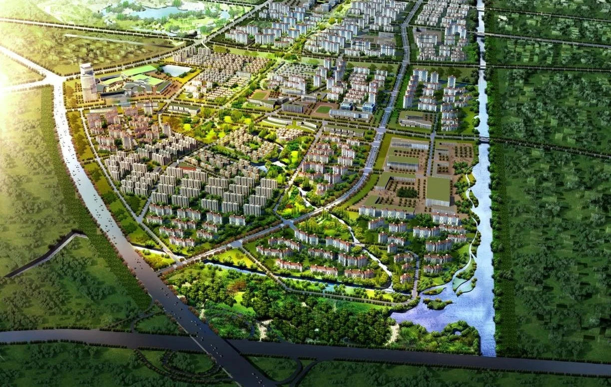A detailed aerial view of an urban development plan with residential buildings, green spaces, roads, rivers, and surrounding natural areas.