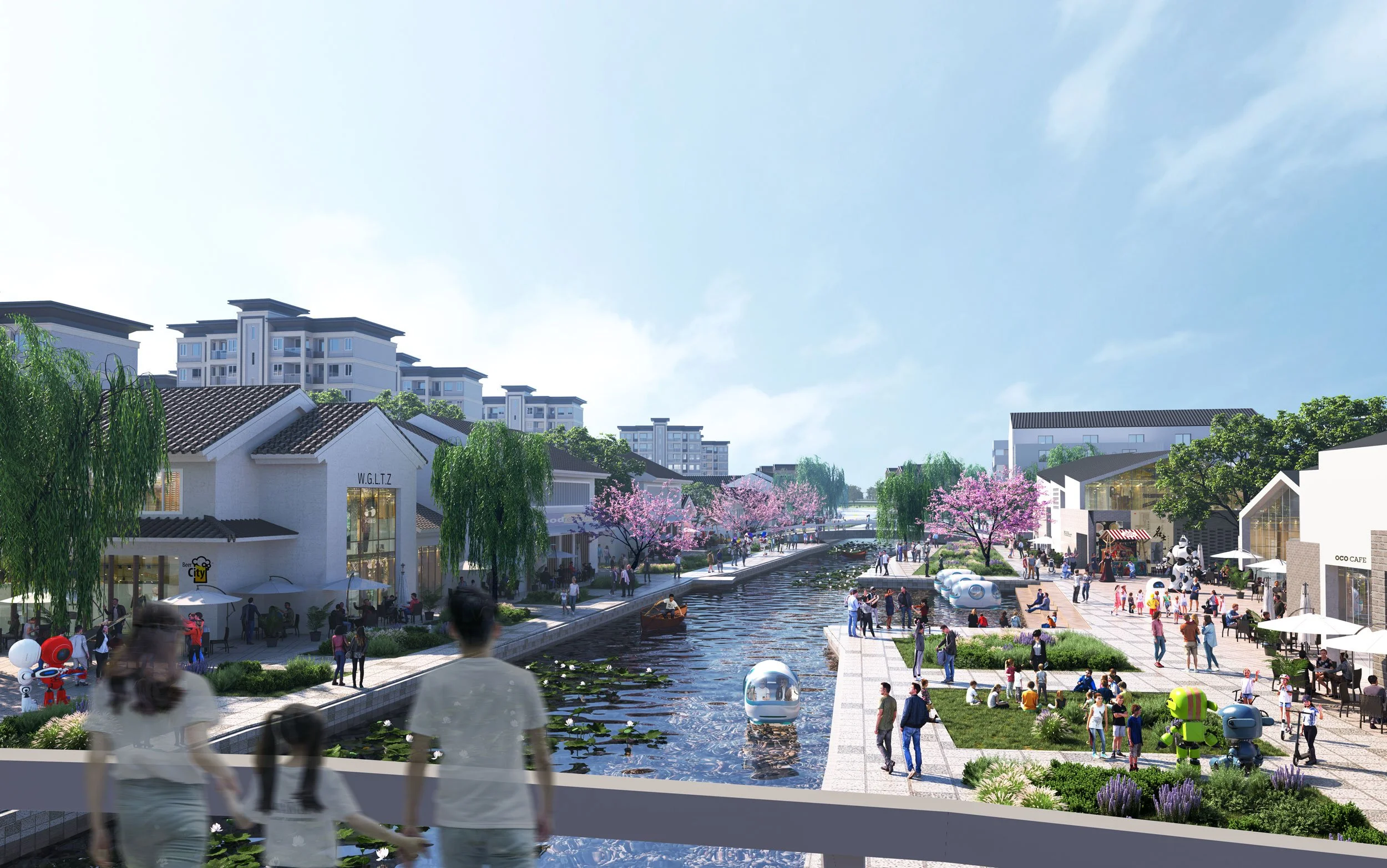A lively outdoor commercial area with a waterway, pink flowering trees, and modern buildings on both sides. People are walking, sitting, and children are playing among shops and cafes, with some robot-like figures near the water.