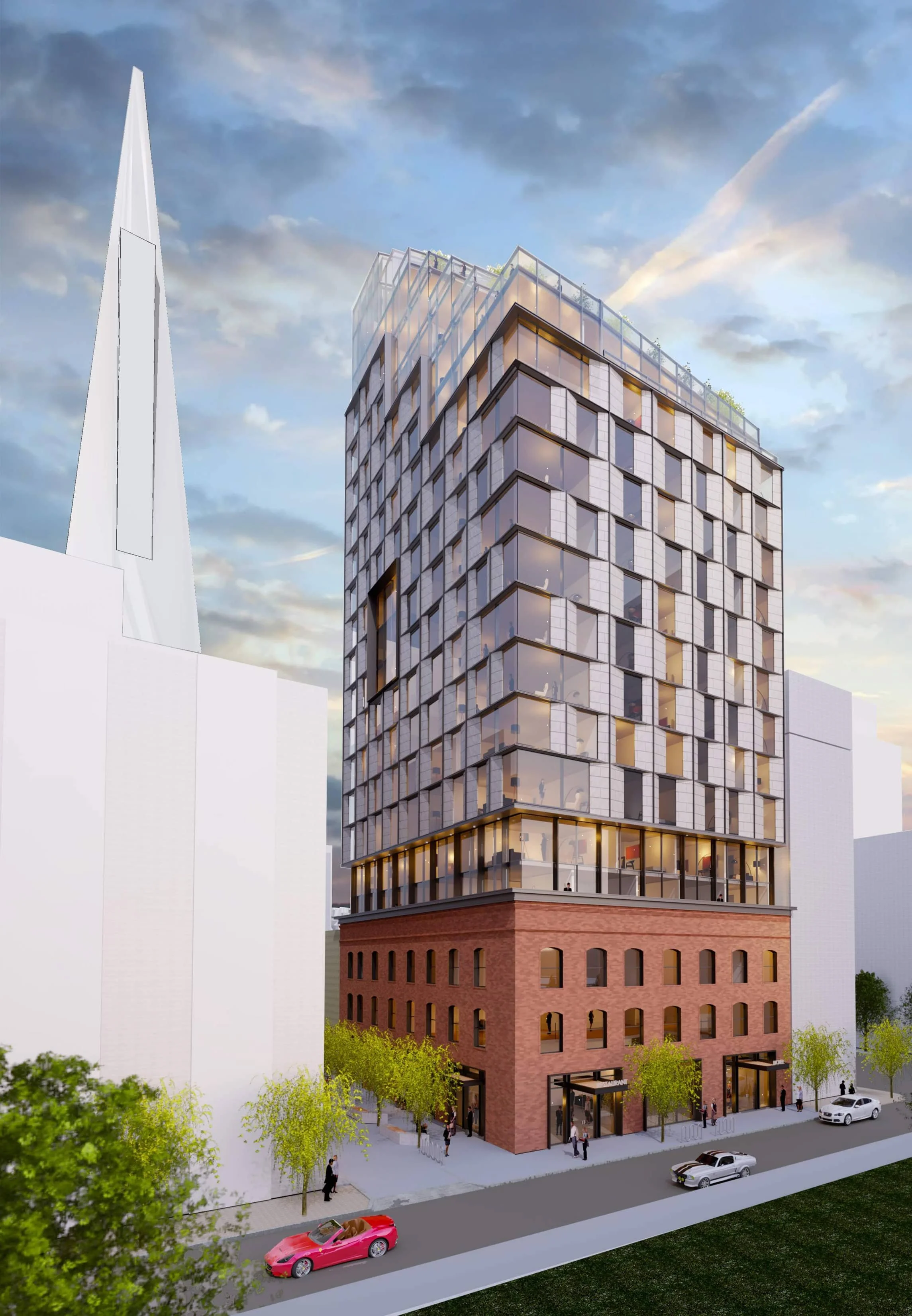 A modern multi-story building with glass windows and a brick lower section, surrounded by trees, with cars and pedestrians on the street in front, during daytime with a partly cloudy sky.