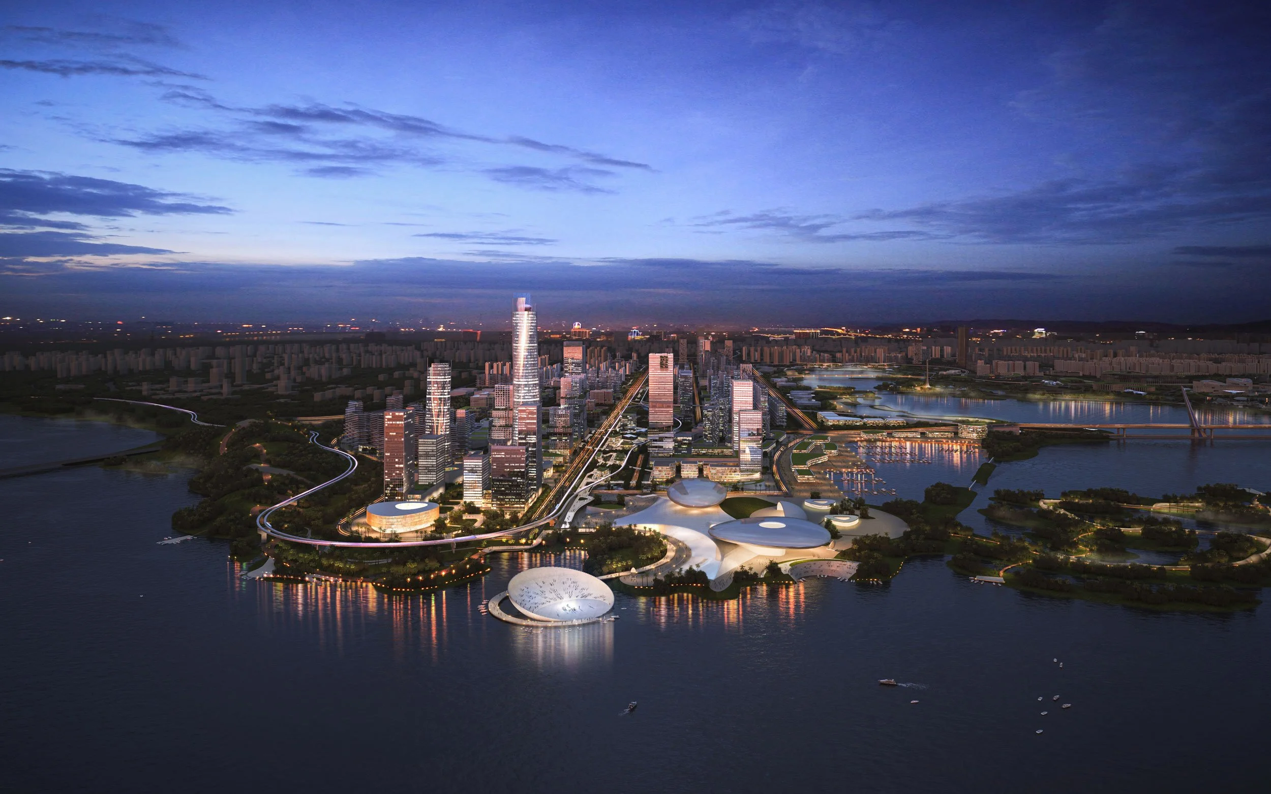 Nighttime aerial view of a modern city skyline with tall skyscrapers, a lake with boats, green parks, and illuminated pathways and buildings.