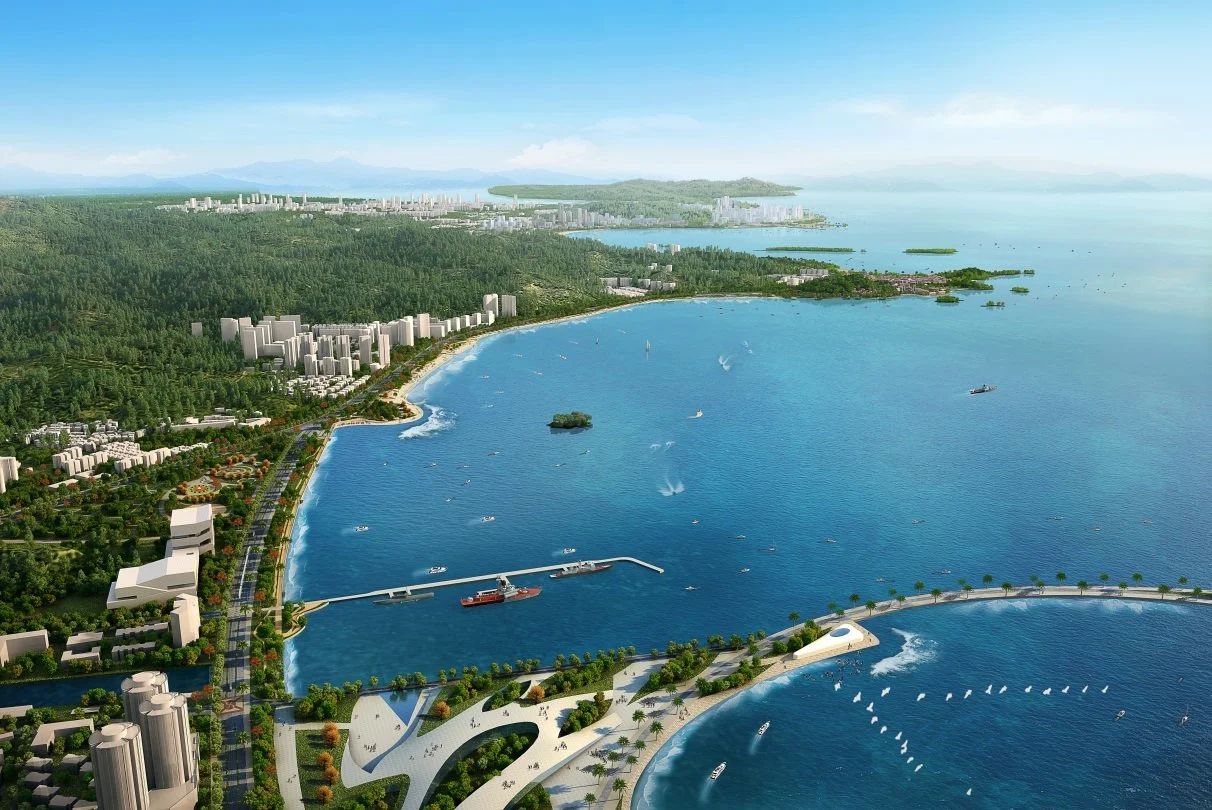 A digital rendering of a coastal city with high-rise buildings, a curved shoreline, boats on the water, and a lush green landscape in the background.