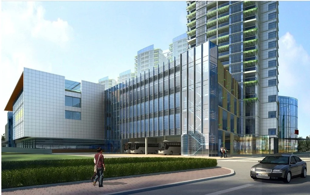 Modern cityscape with high-rise glass buildings, a pedestrian walking on a sidewalk, and cars on the street.