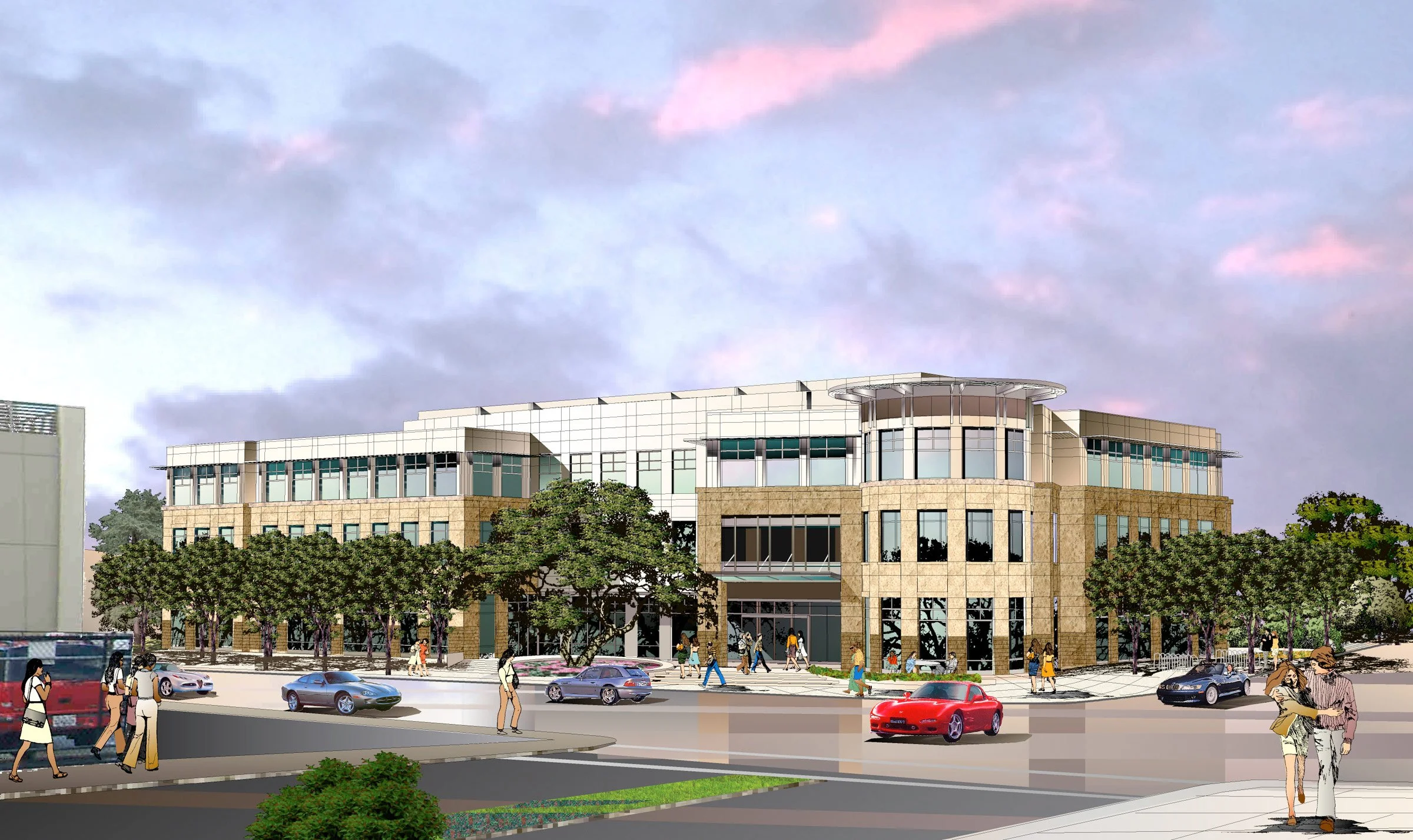 A modern multi-story building with glass windows and a beige stone facade, surrounded by trees and a busy street with pedestrians and cars.