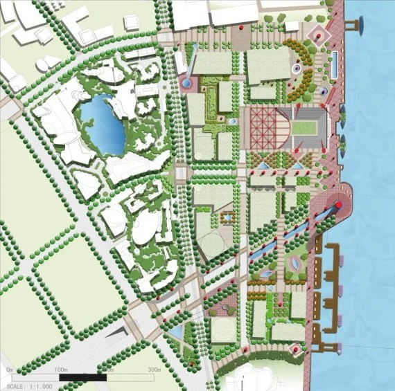 A detailed map of a large urban park or development area showing pathways, green spaces, water features, buildings, and beachfront or waterfront areas.