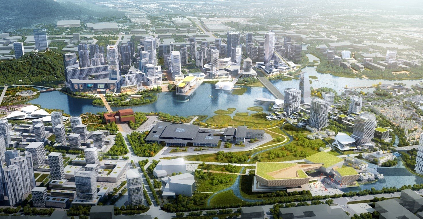 Aerial view of a modern cityscape with numerous high-rise buildings, green parks, waterways, and bridges.