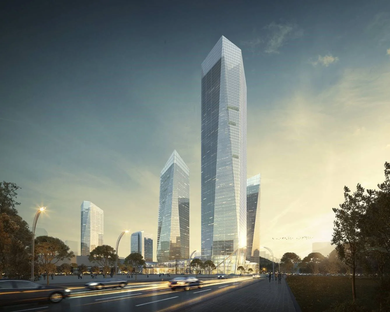 A cityscape with tall modern glass skyscrapers, a wide road with cars, trees, and streetlights at sunset.