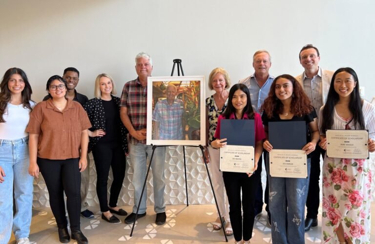 Douglas W. Masson Memorial Scholarship recipients and parents pose for a group photo.