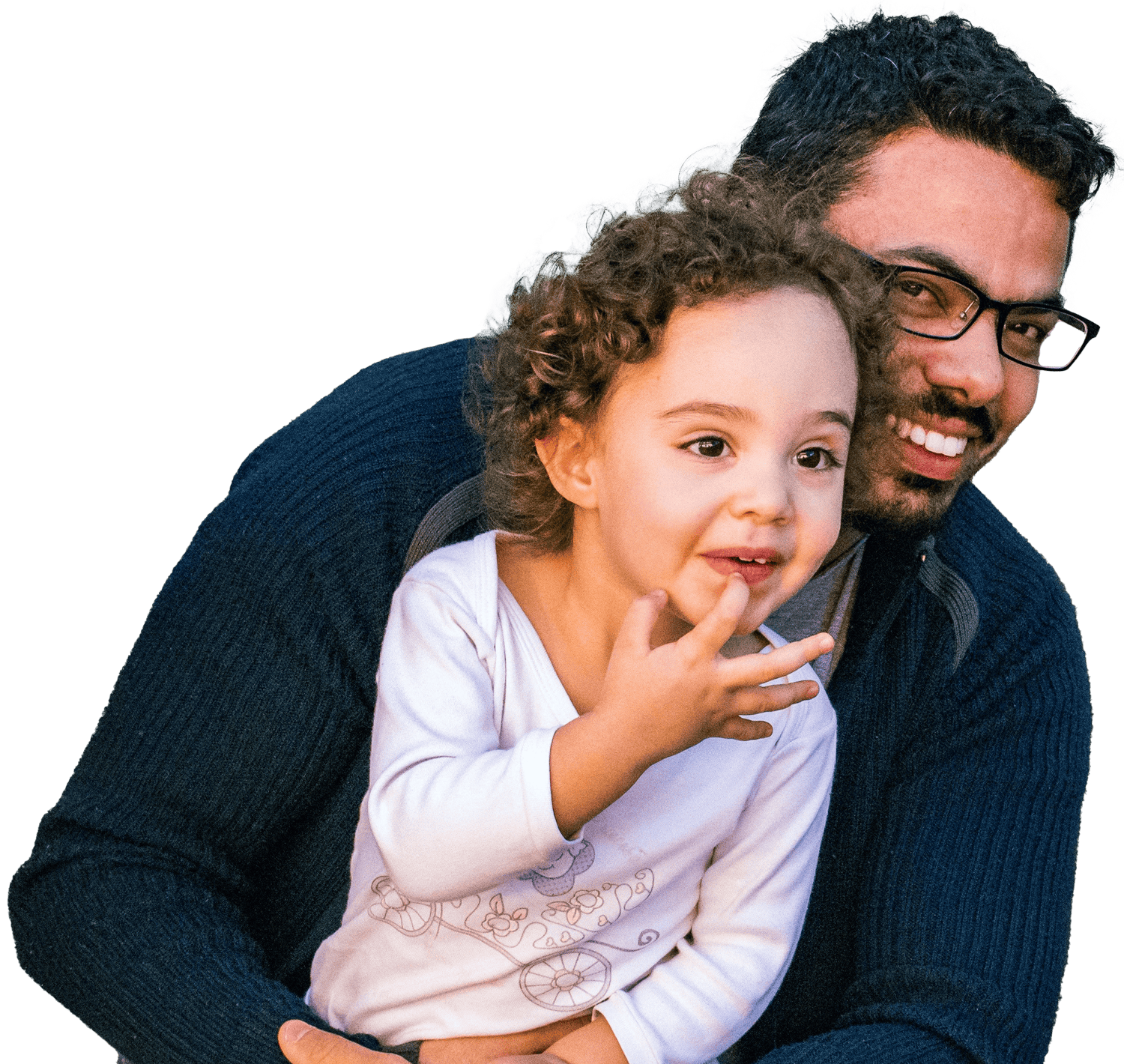 A smiling father holds his young daughter.