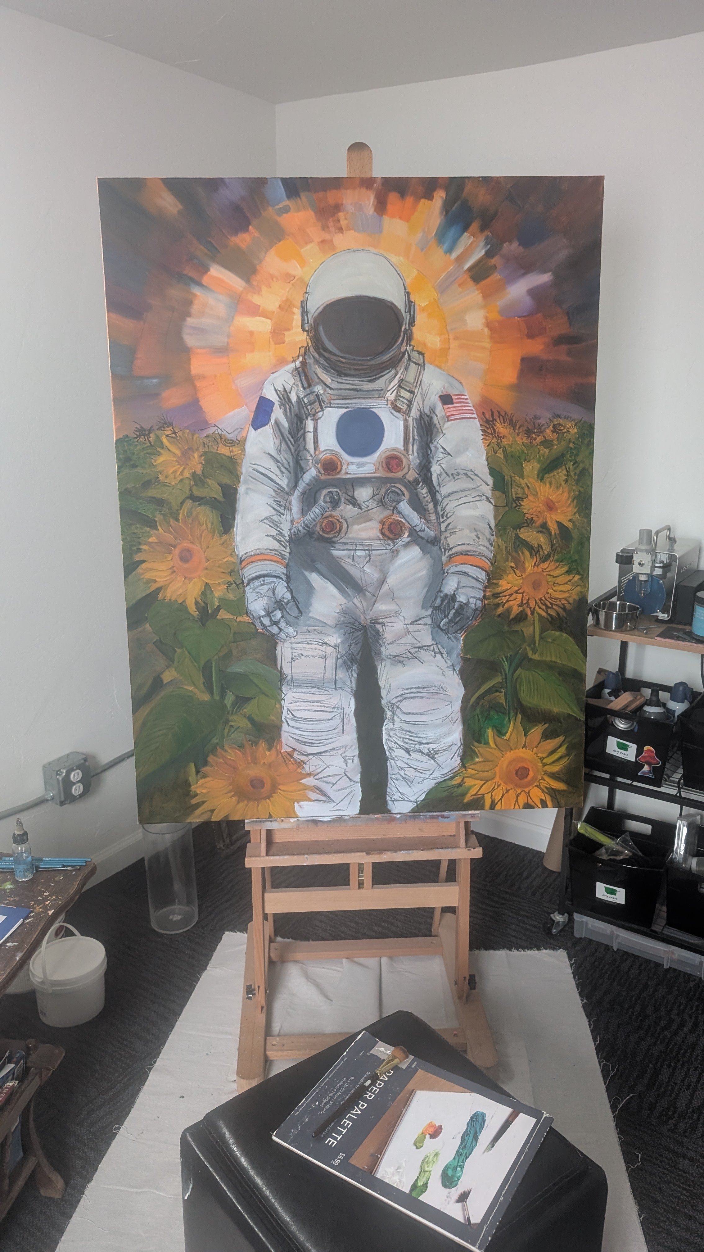 A painting of an astronaut standing in the middle of a sunflower field, with a colorful, radiant background resembling a sunset or sunrise.