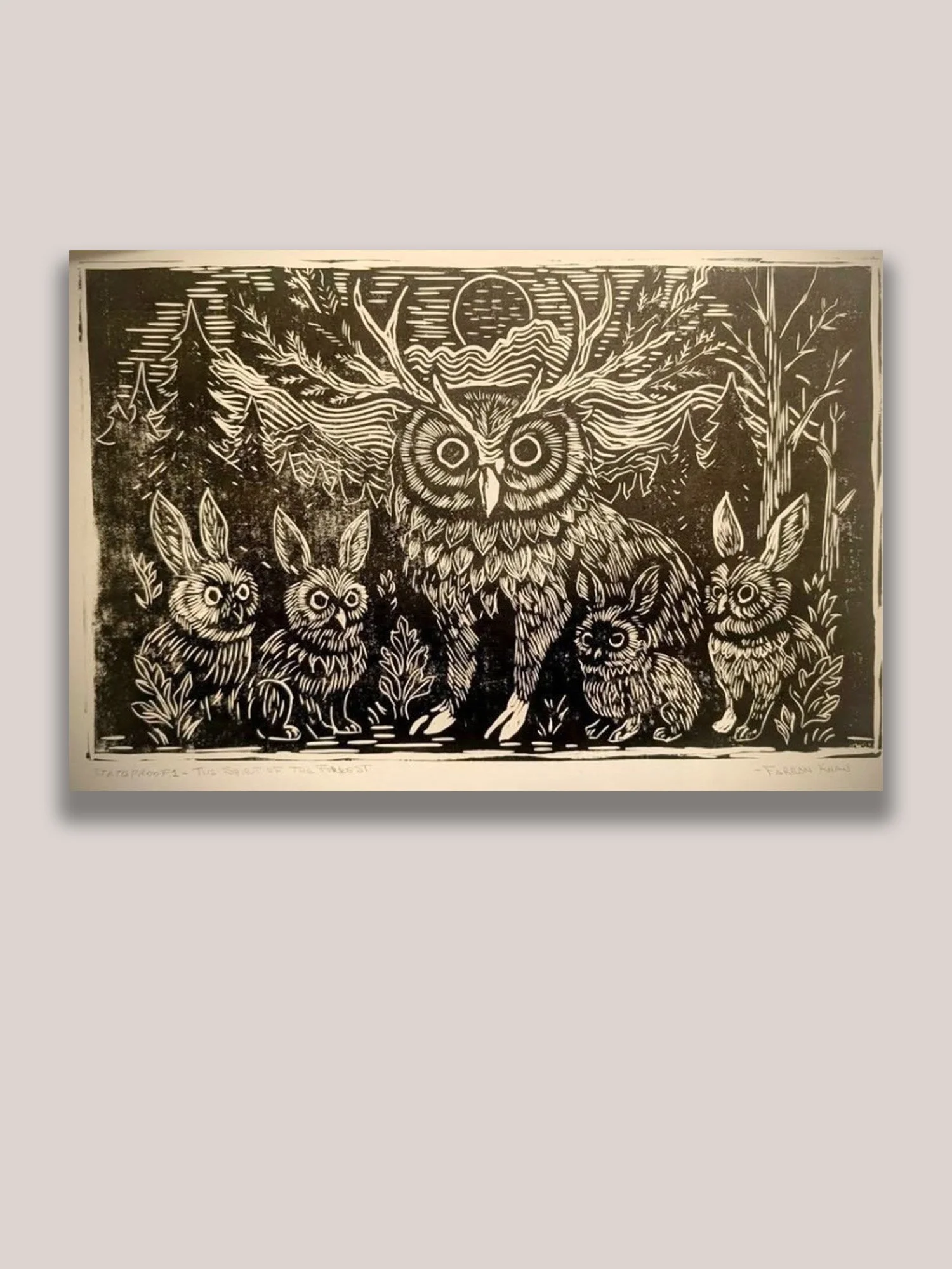 Linocut print depicting a mythical owl-deer spirit surrounded by rabbit companions beneath a moonlit forest sky. Contemporary wildlife print inspired by folklore, nature, and the symbolic connection between animals and the natural world.