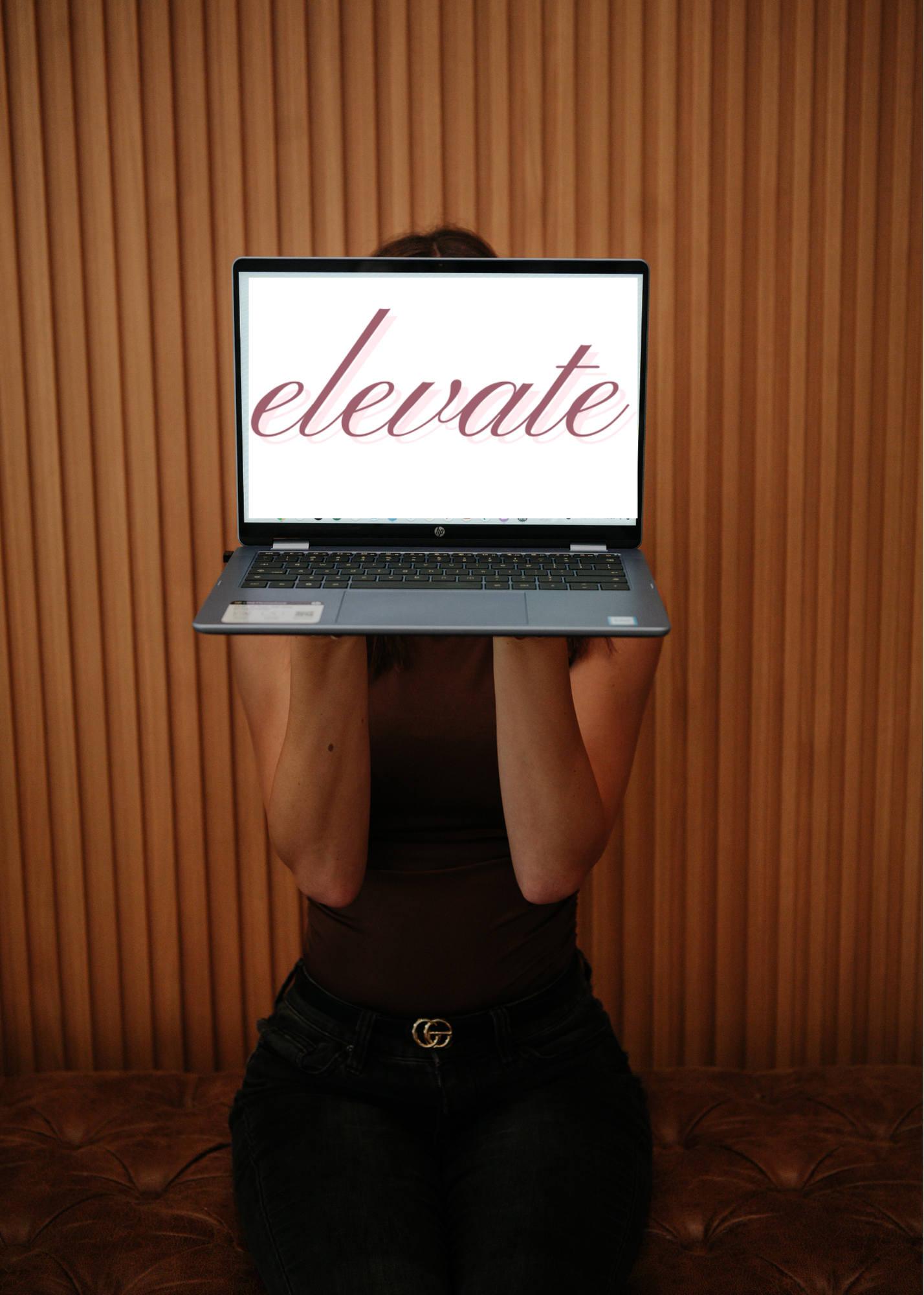 The word 'elevate' written in pink cursive text with a black background.