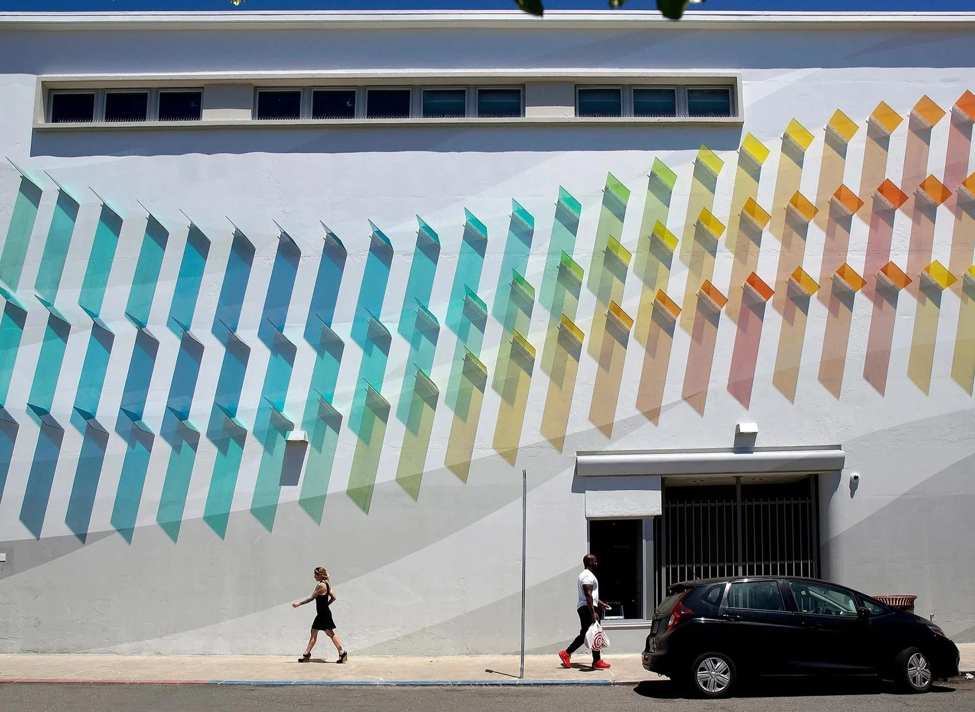 Wave of Change (Target North Park), 2019
Polycarbonate, metal brackets, paint, 35 x 80 x 2 feet