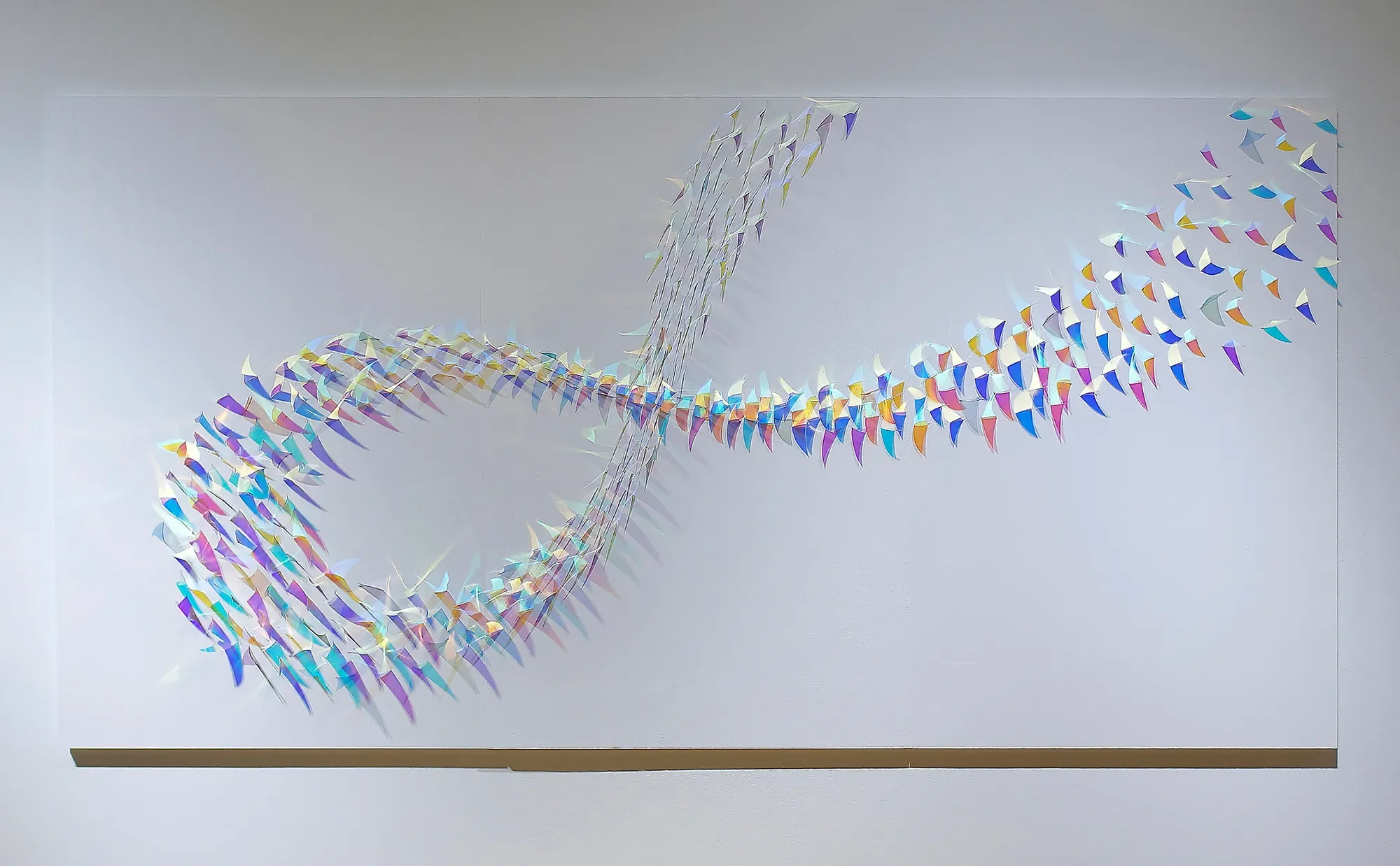 Undercurrent, 2023
Dichroic film on foam board, 45 x 90 x 4 inches