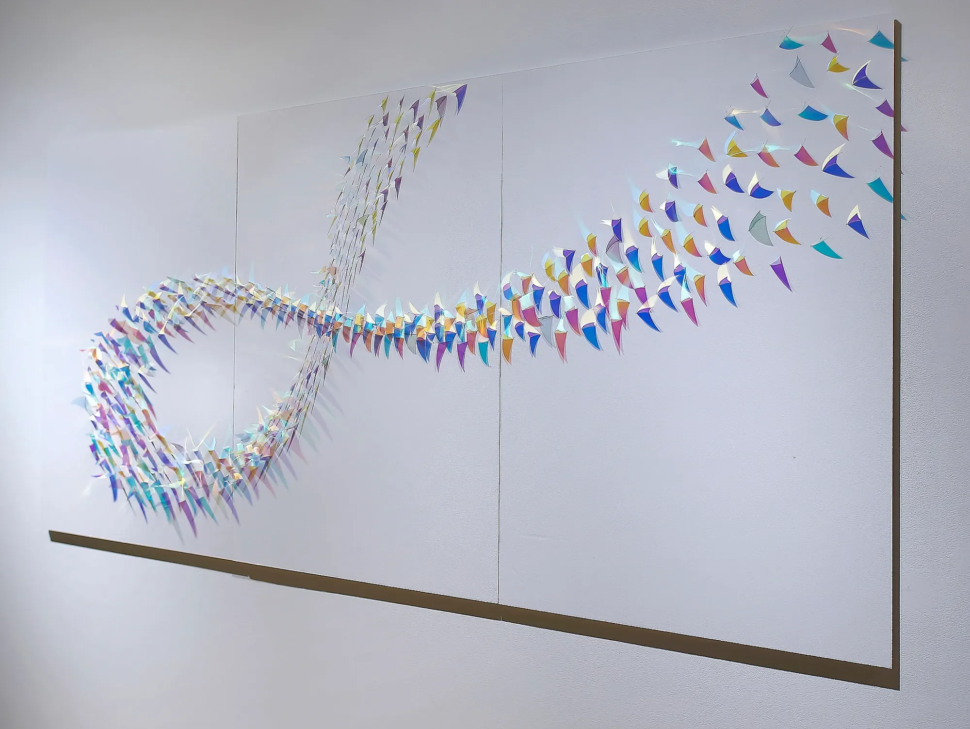 Undercurrent, 2023
Dichroic film on foam board, 45 x 90 x 4 inches