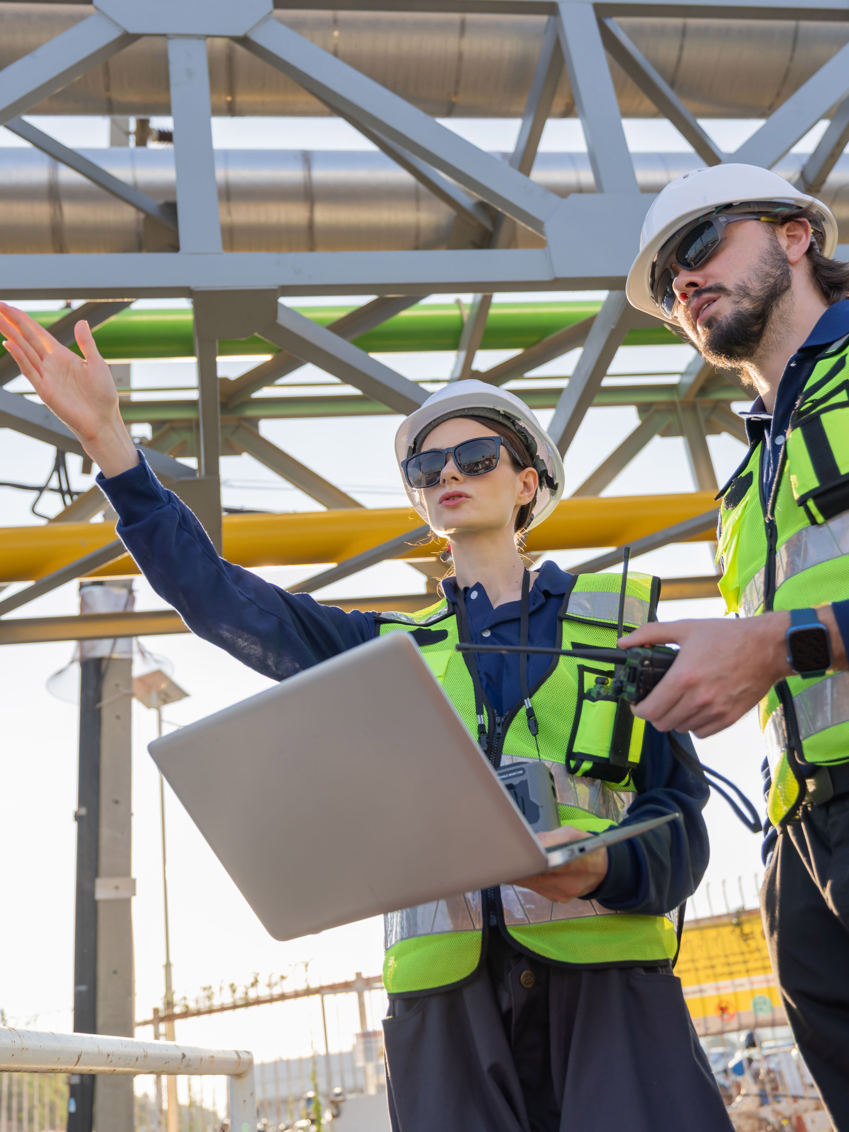 Engineers conducting field observations at an active construction site.