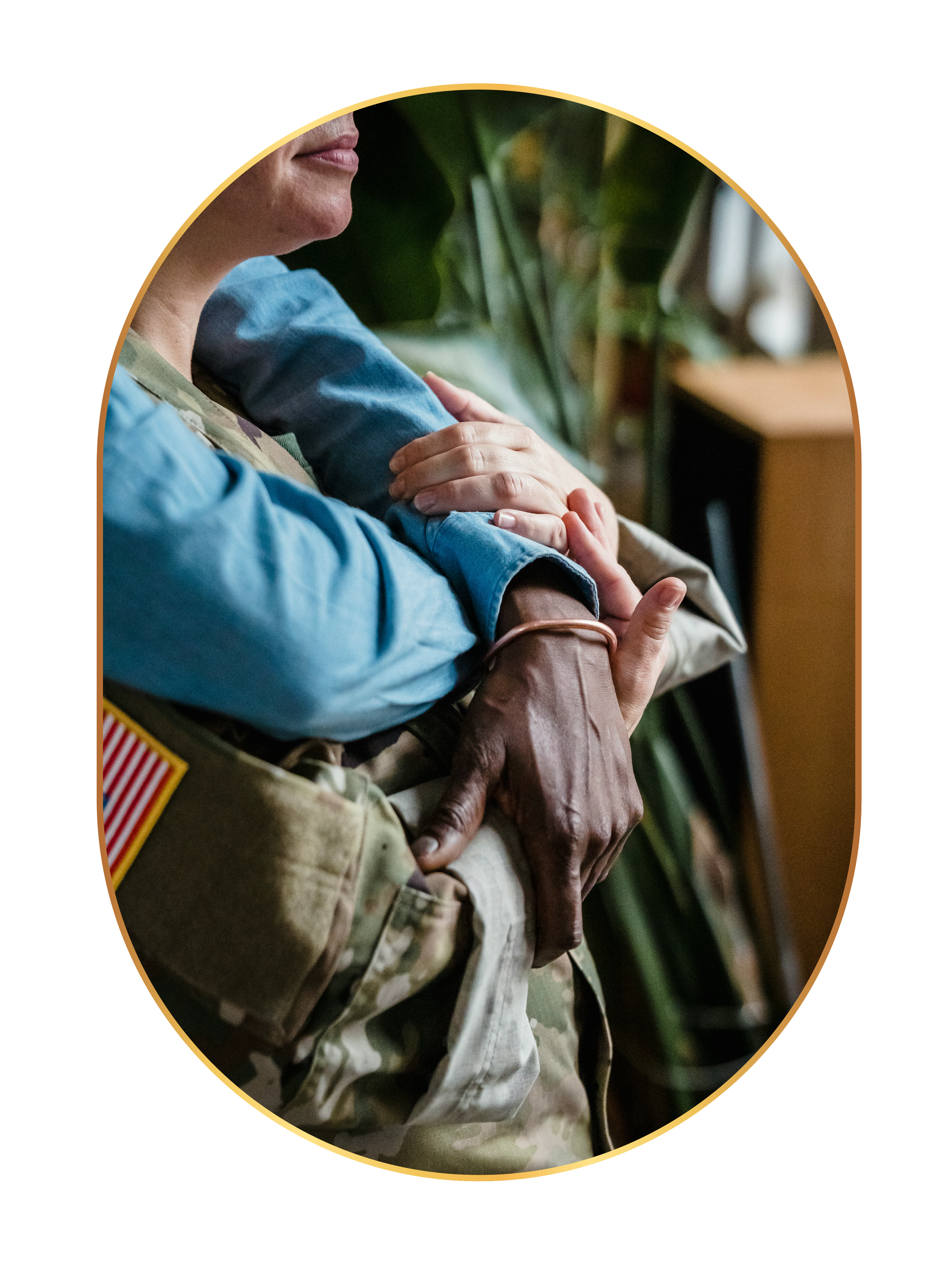 Close-up of a veteran in military uniform with a women in civilian clothing resting her hand on his arm, showing support and compassion.