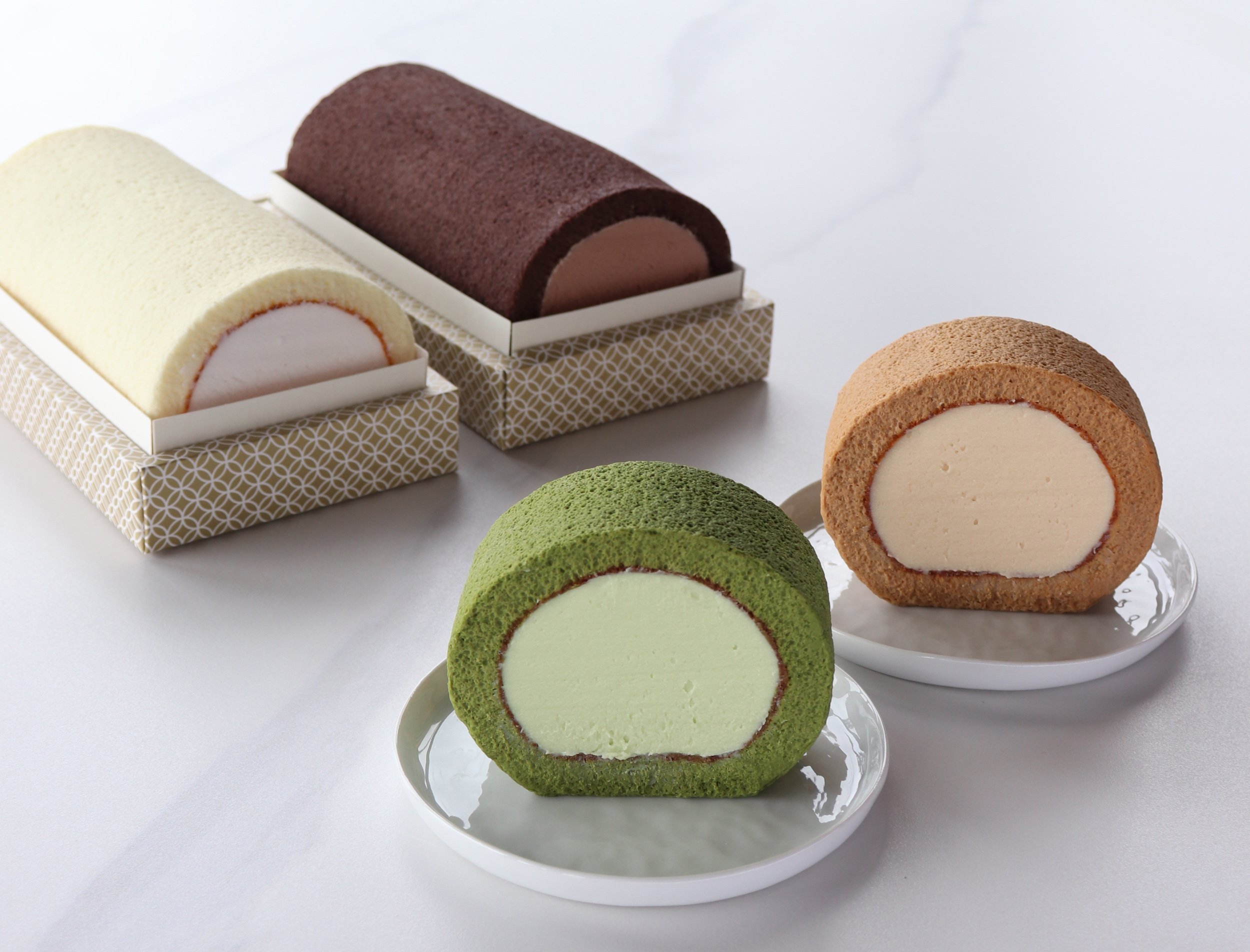 Fresh cream roll cakes including matcha and vanilla roll cake from WOW Bakery.