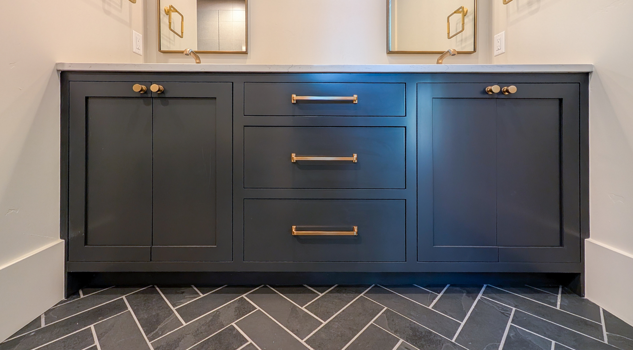 Bathroom sink vanity black with gold hardware.png