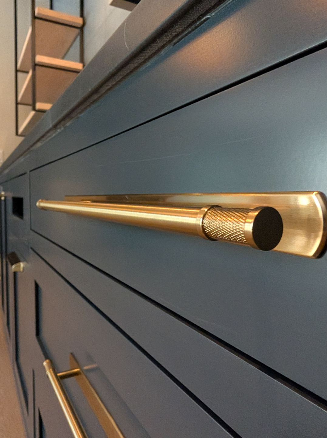 Cabinetry hardware close up gold.png