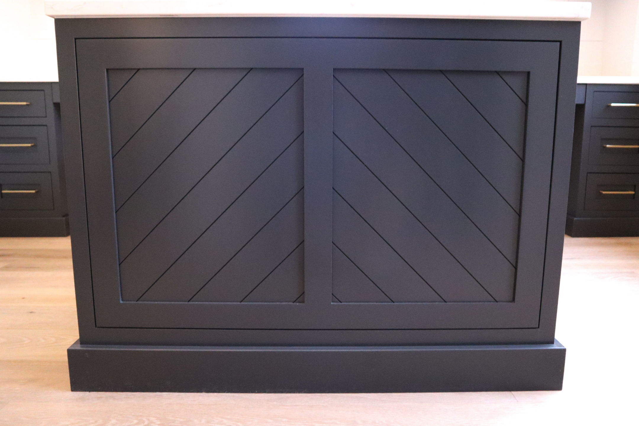 Black Cabinetry Close Up Fine Woodwork.png