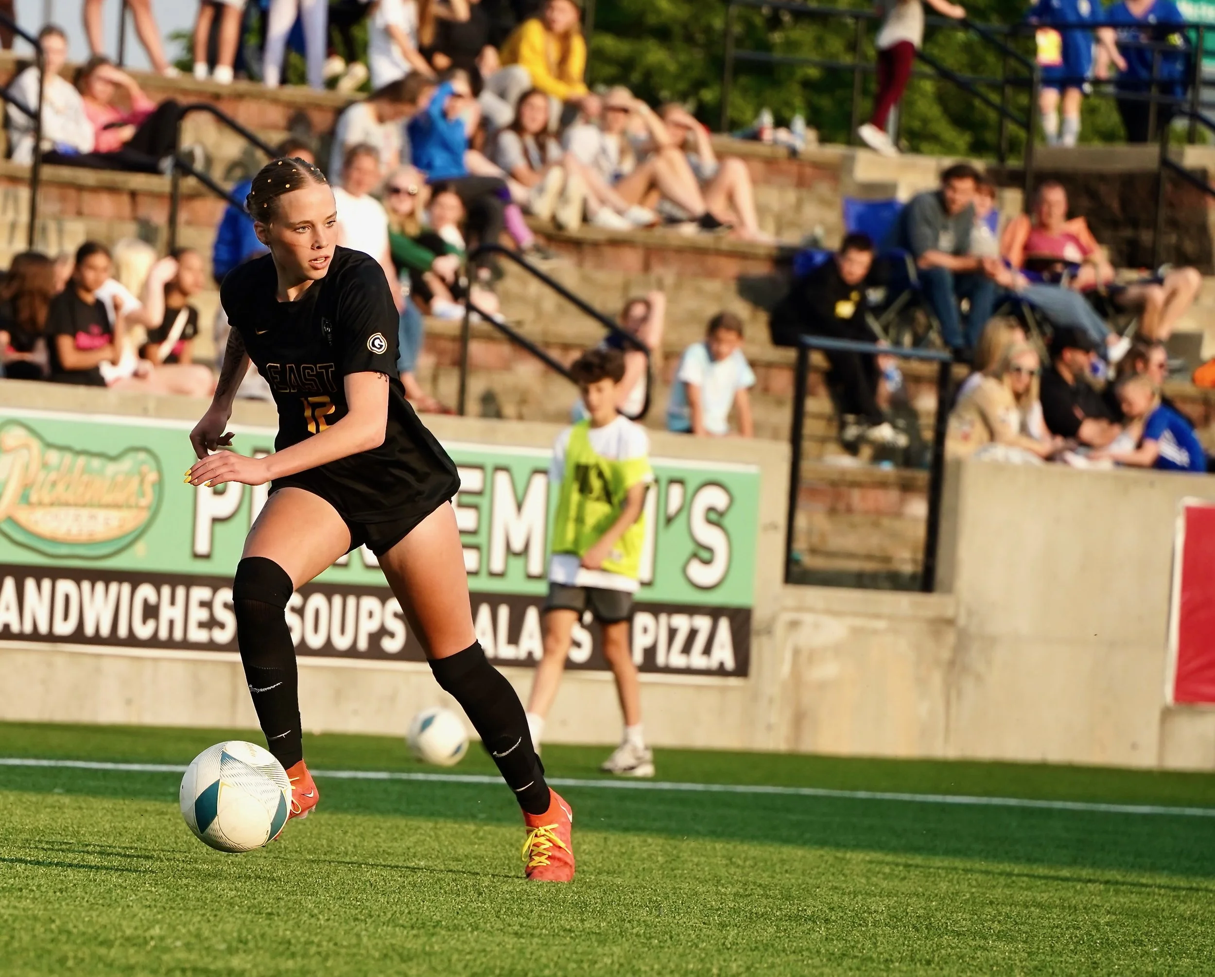 2024 - On May 13 in the state championship against Duchense, junior Kendall Doberstein looks to make a pass to junior Sonora DeFini. The pass was successful and led DeFini to breaking the all-class state record of goals in a single season with 55 goa