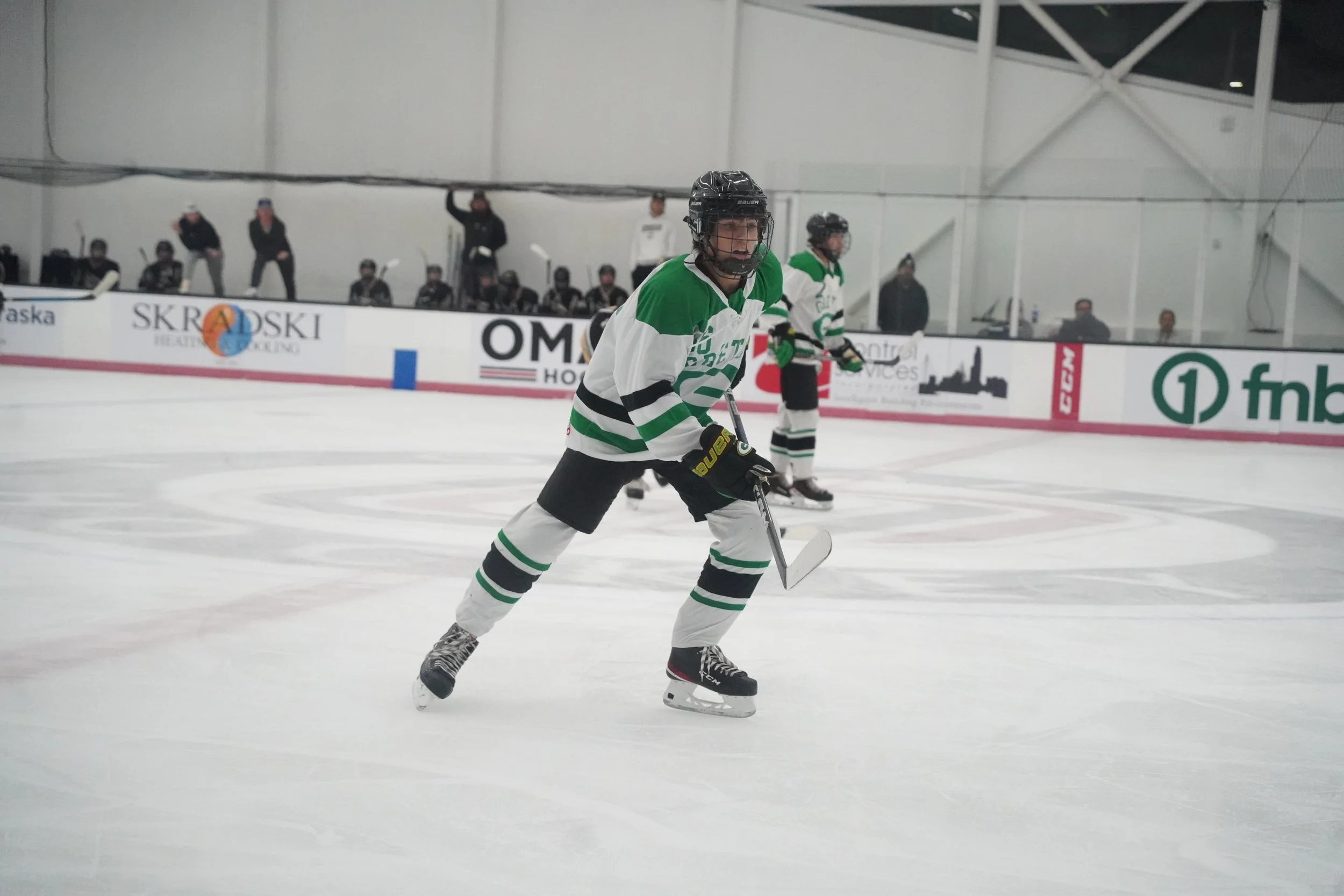 2023 - Focused, junior Braden Dall rushes toward the puck at a hockey game against Fremont on Oct. 26. The team lost 4-0. 