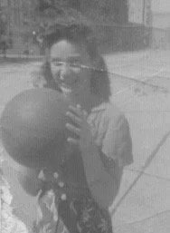 Rose shooting baskets in the Bronx, early 1940s