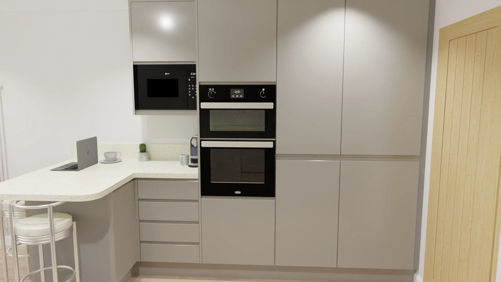 Double oven with worktop nearby, Breakfast Bar and integrated microwave, matching all the other appliances