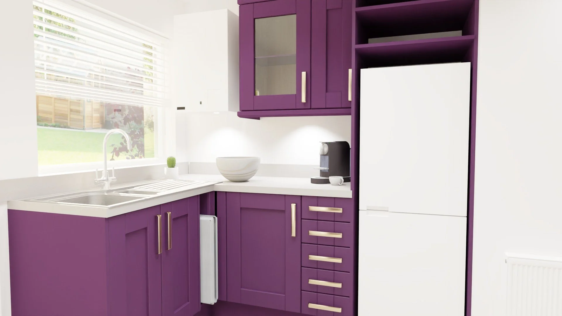 A bright and artistic kitchen, matching purple units and brushed brass D handles. The client wanted this kitchen to represent her personality, so I helped her achieve that. The fridge freezer has open shelving above for extra storage.