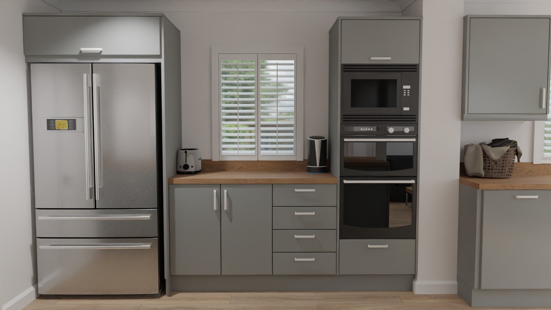 American fridge freezer with a bridging unit over it for extra storage space. Double oven and integrated microwave housing with a worktop beside it to safely place trays.