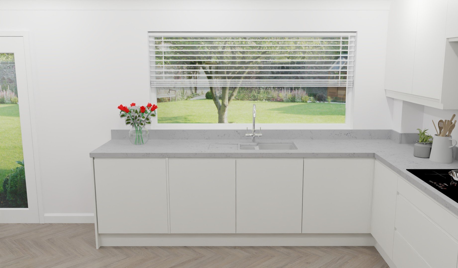 1.5 Undermount sink by the window, with an upstand to make cleaning easier.